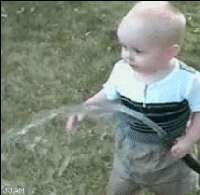 Kid_drinks_hose.gif